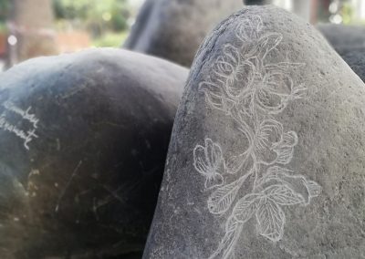 Elena Bajo, The Flower Who Came from the Stars, Engraved basaltic rocks, Las Palmas de Gran Canaria, 2022